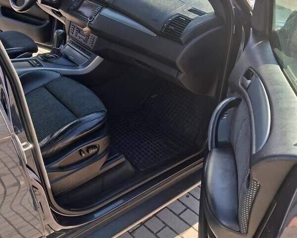 Синий БМВ Х5, объемом двигателя 2.99 л и пробегом 360 тыс. км за 10700 $, фото 11 на Automoto.ua