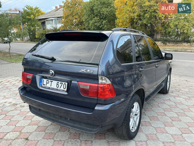 Синій БМВ Х5, об'ємом двигуна 3 л та пробігом 340 тис. км за 6299 $, фото 4 на Automoto.ua