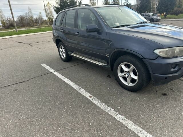 Синій БМВ Х5, об'ємом двигуна 3 л та пробігом 271 тис. км за 5400 $, фото 2 на Automoto.ua