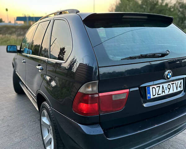 Синий БМВ Х5, объемом двигателя 3 л и пробегом 350 тыс. км за 7400 $, фото 5 на Automoto.ua