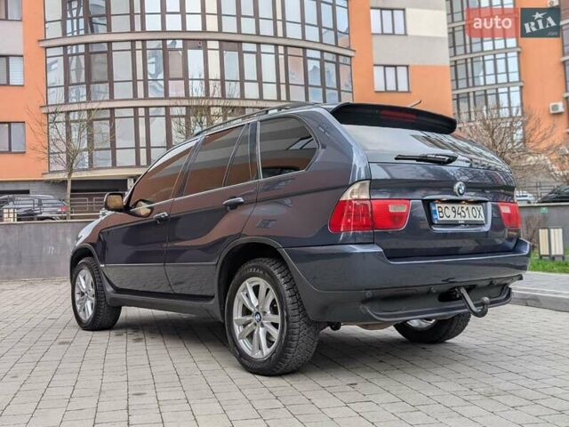 Синій БМВ Х5, об'ємом двигуна 3 л та пробігом 362 тис. км за 12700 $, фото 28 на Automoto.ua
