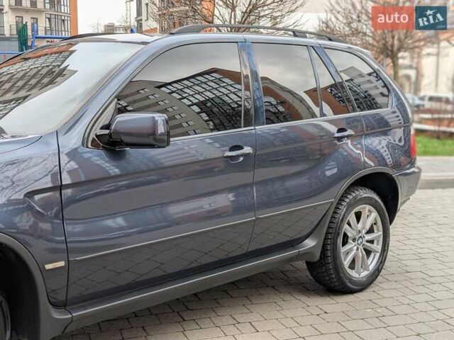 Синій БМВ Х5, об'ємом двигуна 3 л та пробігом 362 тис. км за 12700 $, фото 17 на Automoto.ua