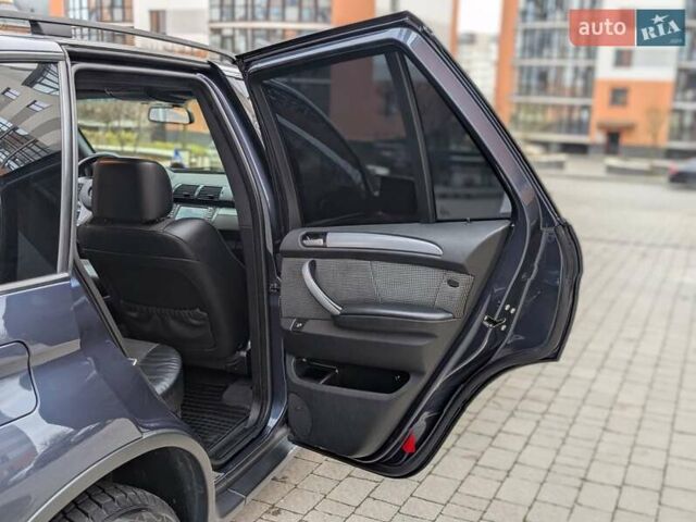 Синій БМВ Х5, об'ємом двигуна 3 л та пробігом 362 тис. км за 12700 $, фото 52 на Automoto.ua