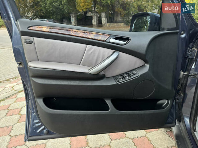 Синій БМВ Х5, об'ємом двигуна 3 л та пробігом 340 тис. км за 6299 $, фото 18 на Automoto.ua