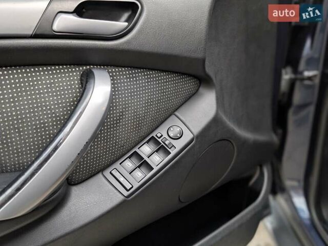 Синій БМВ Х5, об'ємом двигуна 3 л та пробігом 362 тис. км за 12700 $, фото 44 на Automoto.ua