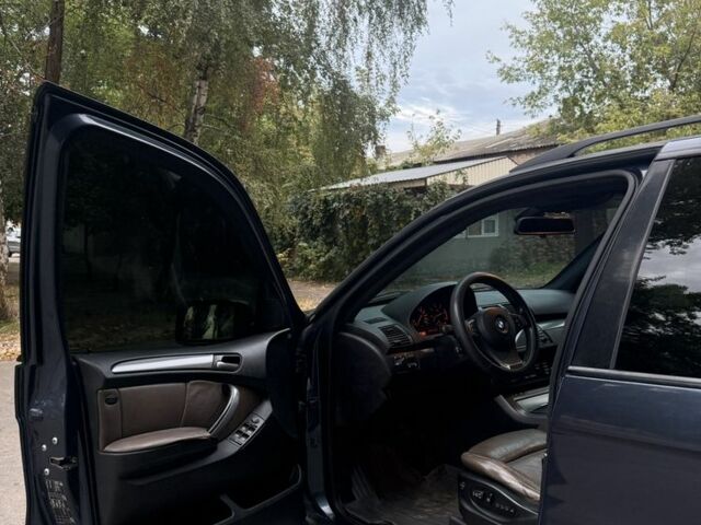 Синий БМВ Х5, объемом двигателя 3 л и пробегом 300 тыс. км за 5500 $, фото 8 на Automoto.ua