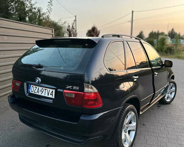 Синий БМВ Х5, объемом двигателя 3 л и пробегом 350 тыс. км за 7400 $, фото 6 на Automoto.ua
