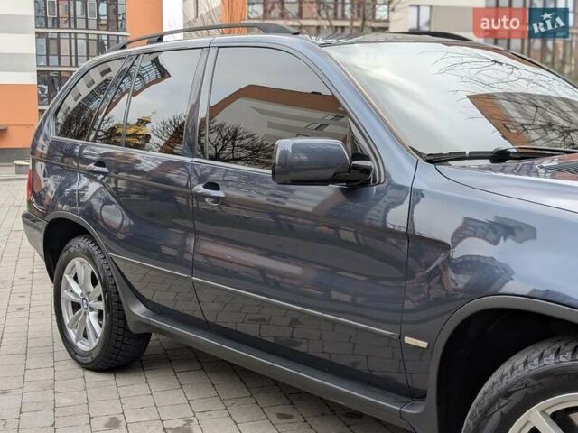 Синій БМВ Х5, об'ємом двигуна 3 л та пробігом 362 тис. км за 12700 $, фото 16 на Automoto.ua