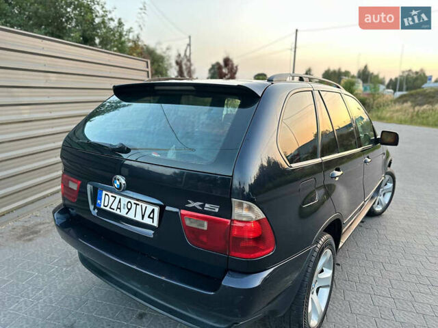 Синий БМВ Х5, объемом двигателя 3 л и пробегом 350 тыс. км за 7400 $, фото 4 на Automoto.ua