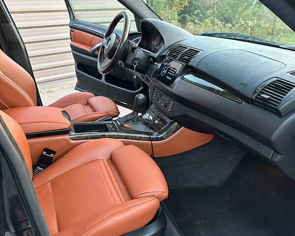 Синий БМВ Х5, объемом двигателя 3 л и пробегом 350 тыс. км за 7400 $, фото 10 на Automoto.ua
