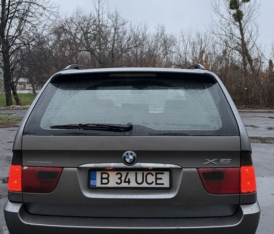 Синий БМВ Х5, объемом двигателя 3 л и пробегом 300 тыс. км за 6200 $, фото 5 на Automoto.ua