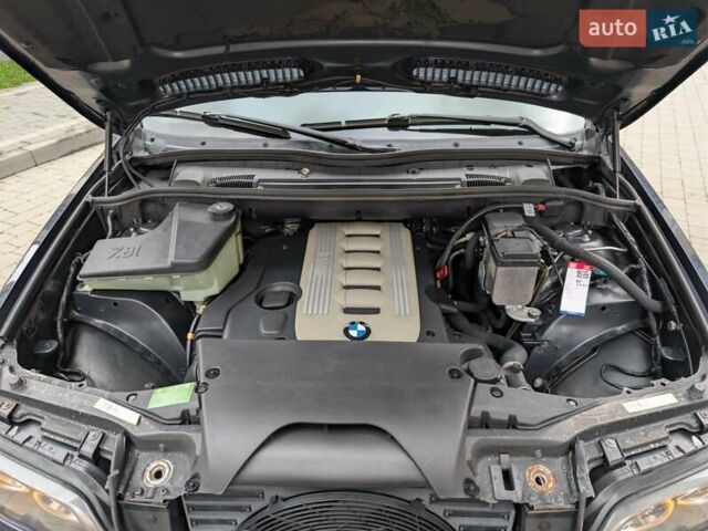 Синій БМВ Х5, об'ємом двигуна 3 л та пробігом 362 тис. км за 12700 $, фото 23 на Automoto.ua
