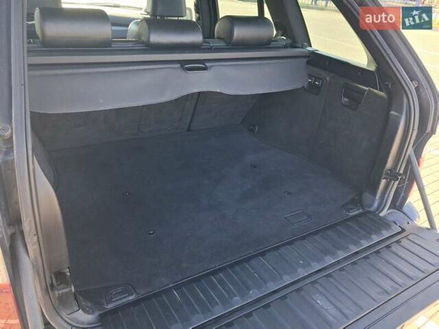 Синий БМВ Х5, объемом двигателя 2.99 л и пробегом 360 тыс. км за 10700 $, фото 1 на Automoto.ua