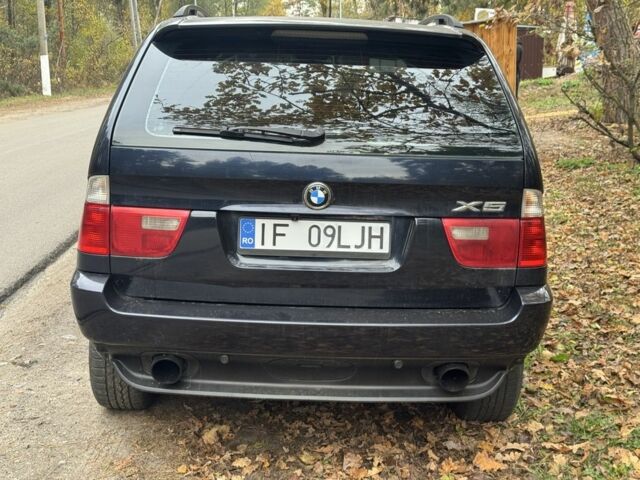 Синий БМВ Х5, объемом двигателя 3 л и пробегом 230 тыс. км за 4600 $, фото 4 на Automoto.ua