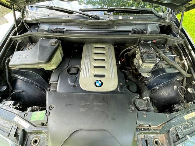 Синий БМВ Х5, объемом двигателя 3 л и пробегом 370 тыс. км за 10000 $, фото 7 на Automoto.ua