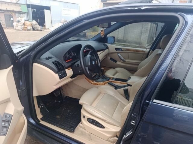 Синий БМВ Х5, объемом двигателя 3 л и пробегом 300 тыс. км за 5400 $, фото 7 на Automoto.ua