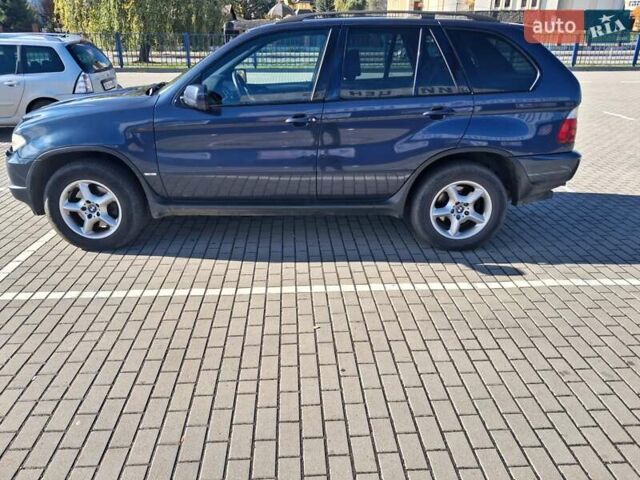 Синий БМВ Х5, объемом двигателя 2.99 л и пробегом 360 тыс. км за 10700 $, фото 4 на Automoto.ua