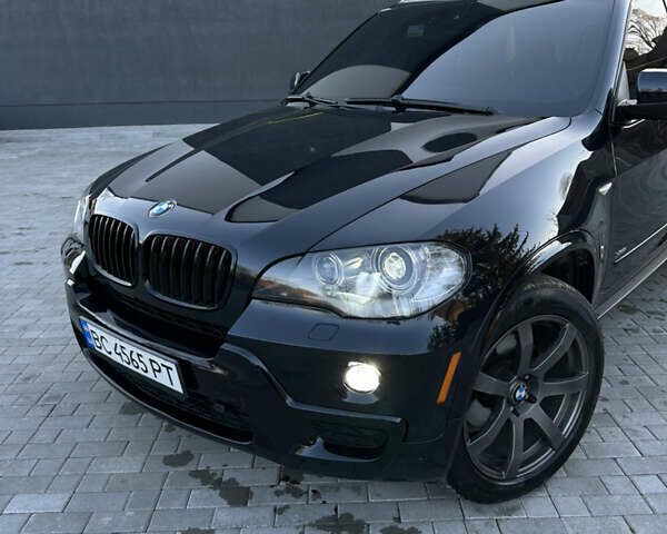 Синий БМВ Х5, объемом двигателя 3 л и пробегом 160 тыс. км за 11999 $, фото 1 на Automoto.ua