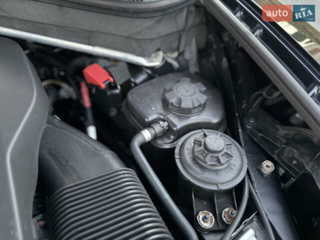 Синій БМВ Х5, об'ємом двигуна 3 л та пробігом 297 тис. км за 19800 $, фото 49 на Automoto.ua