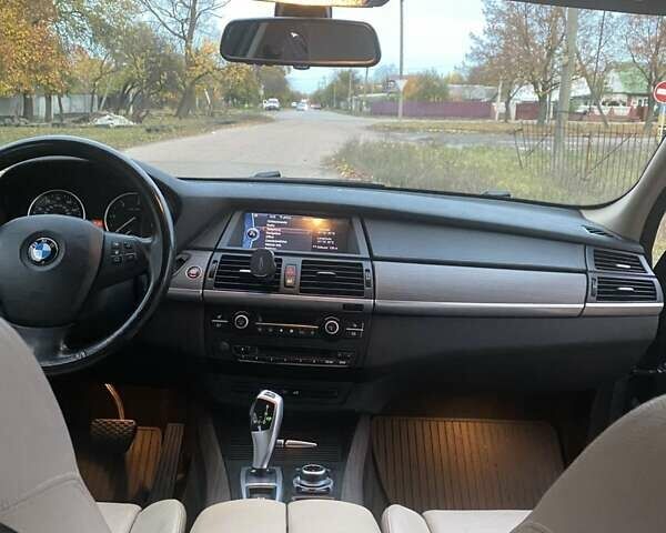 Синий БМВ Х5, объемом двигателя 3 л и пробегом 253 тыс. км за 18300 $, фото 22 на Automoto.ua