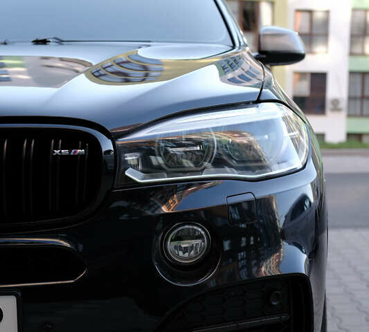 Синий БМВ Х5, объемом двигателя 3 л и пробегом 171 тыс. км за 34000 $, фото 3 на Automoto.ua
