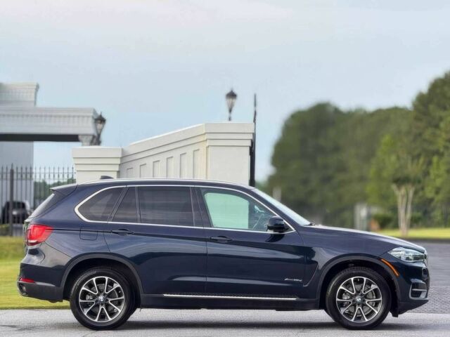 Синий БМВ Х5, объемом двигателя 3 л и пробегом 118 тыс. км за 6800 $, фото 3 на Automoto.ua