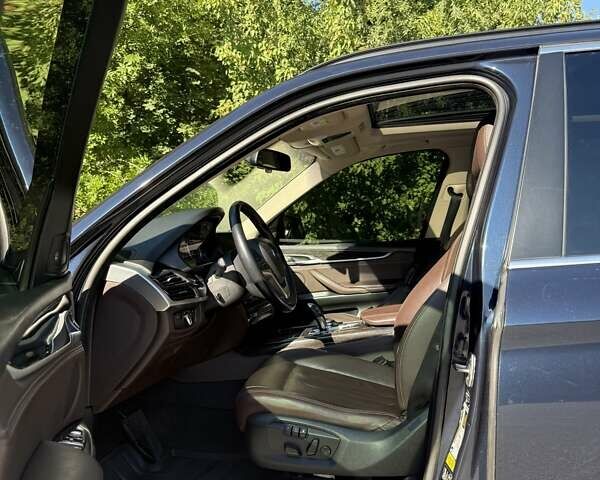 Синій БМВ Х5, об'ємом двигуна 3 л та пробігом 221 тис. км за 30000 $, фото 1 на Automoto.ua