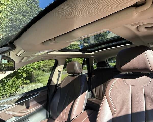 Синій БМВ Х5, об'ємом двигуна 3 л та пробігом 221 тис. км за 30000 $, фото 9 на Automoto.ua