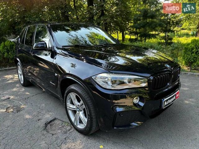 Синій БМВ Х5, об'ємом двигуна 3 л та пробігом 222 тис. км за 30990 $, фото 2 на Automoto.ua