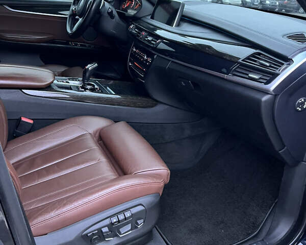 Синий БМВ Х5, объемом двигателя 3 л и пробегом 147 тыс. км за 31600 $, фото 30 на Automoto.ua