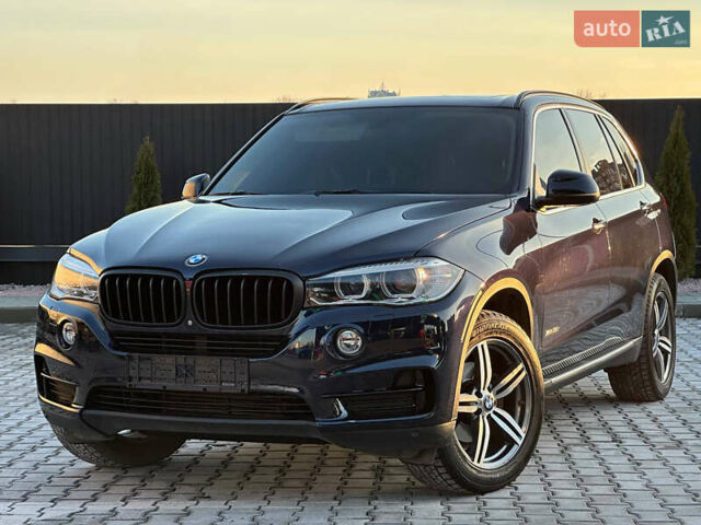 Синий БМВ Х5, объемом двигателя 3 л и пробегом 145 тыс. км за 20999 $, фото 1 на Automoto.ua