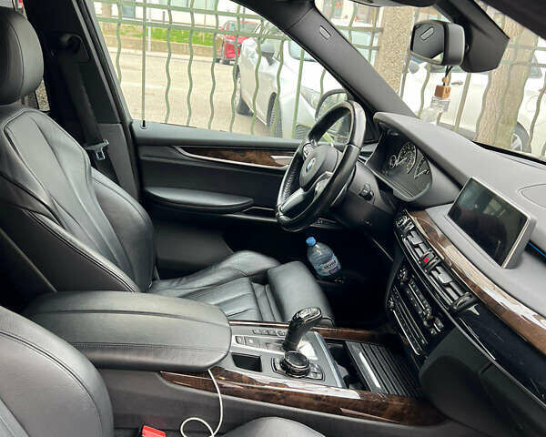 Синий БМВ Х5, объемом двигателя 3 л и пробегом 128 тыс. км за 32000 $, фото 3 на Automoto.ua