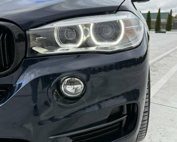 Синий БМВ Х5, объемом двигателя 3 л и пробегом 250 тыс. км за 24900 $, фото 2 на Automoto.ua