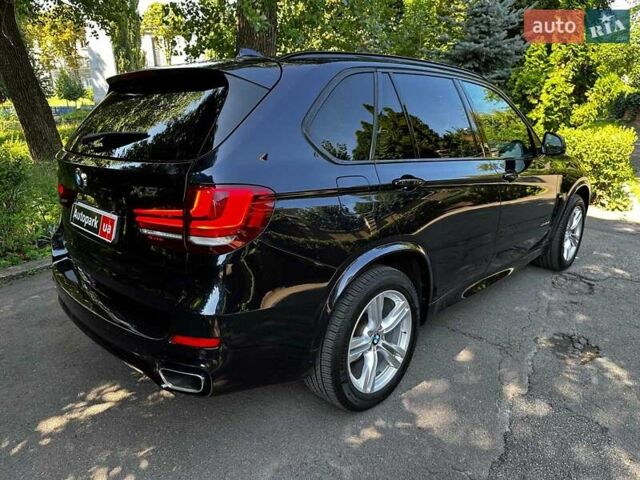 Синій БМВ Х5, об'ємом двигуна 3 л та пробігом 222 тис. км за 30990 $, фото 4 на Automoto.ua