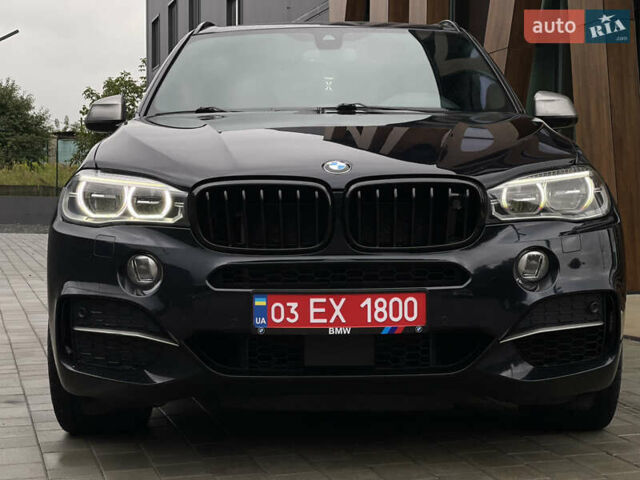Синий БМВ Х5, объемом двигателя 3 л и пробегом 178 тыс. км за 30999 $, фото 2 на Automoto.ua