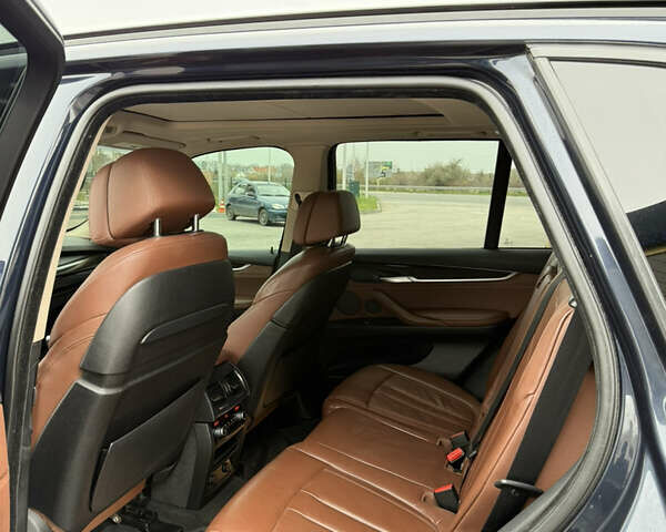 Синий БМВ Х5, объемом двигателя 3 л и пробегом 215 тыс. км за 21000 $, фото 13 на Automoto.ua