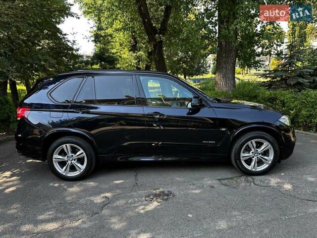 Синій БМВ Х5, об'ємом двигуна 3 л та пробігом 222 тис. км за 30990 $, фото 3 на Automoto.ua