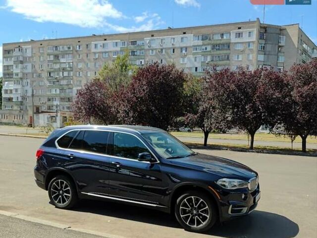 Синий БМВ Х5, объемом двигателя 3 л и пробегом 263 тыс. км за 23800 $, фото 2 на Automoto.ua