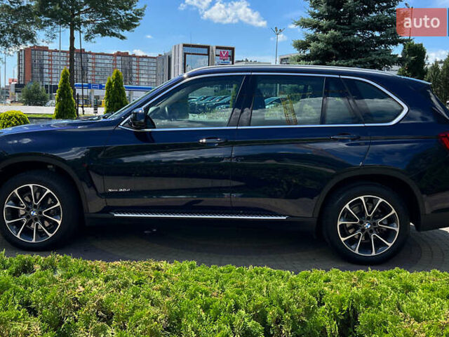 Синий БМВ Х5, объемом двигателя 3 л и пробегом 120 тыс. км за 35750 $, фото 3 на Automoto.ua