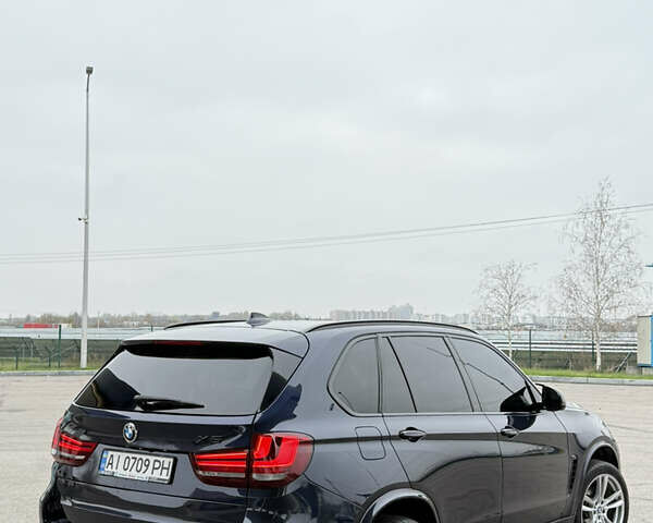 Синий БМВ Х5, объемом двигателя 3 л и пробегом 215 тыс. км за 21000 $, фото 10 на Automoto.ua