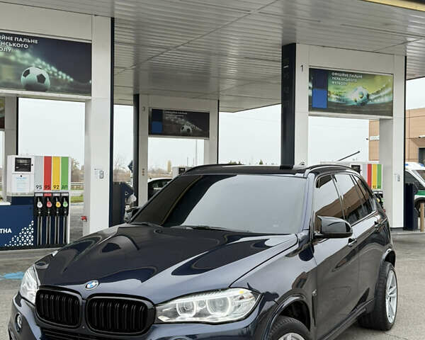 Синий БМВ Х5, объемом двигателя 3 л и пробегом 215 тыс. км за 21000 $, фото 2 на Automoto.ua