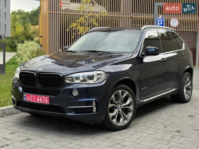 Синій БМВ Х5, об'ємом двигуна 3 л та пробігом 248 тис. км за 26000 $, фото 3 на Automoto.ua
