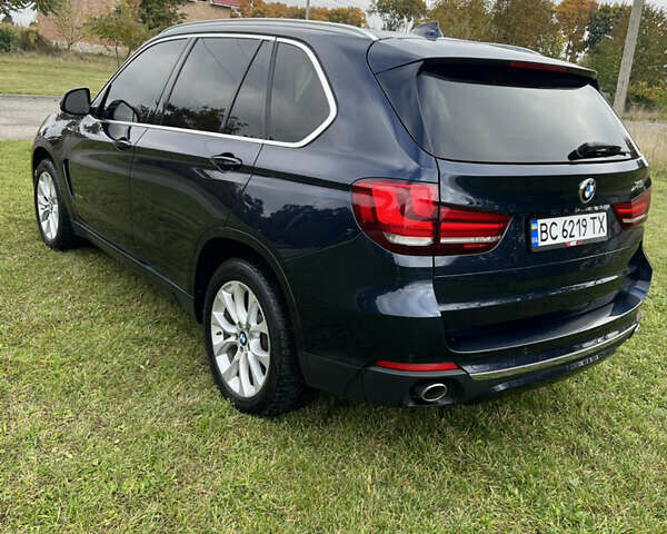 Синий БМВ Х5, объемом двигателя 2.99 л и пробегом 209 тыс. км за 25000 $, фото 4 на Automoto.ua