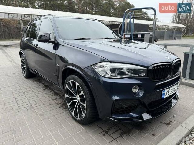 Синій БМВ Х5, об'ємом двигуна 3 л та пробігом 300 тис. км за 28700 $, фото 3 на Automoto.ua