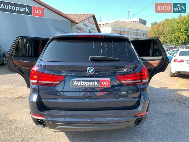 Синий БМВ Х5, объемом двигателя 3 л и пробегом 260 тыс. км за 27480 $, фото 24 на Automoto.ua