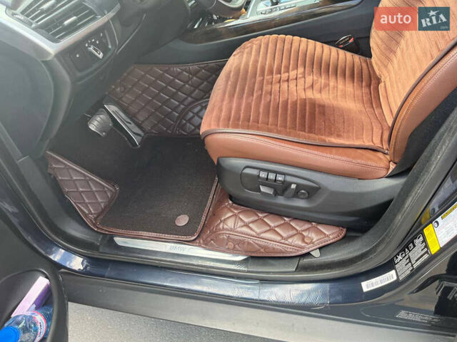 Синій БМВ Х5, об'ємом двигуна 2.98 л та пробігом 171 тис. км за 22977 $, фото 11 на Automoto.ua