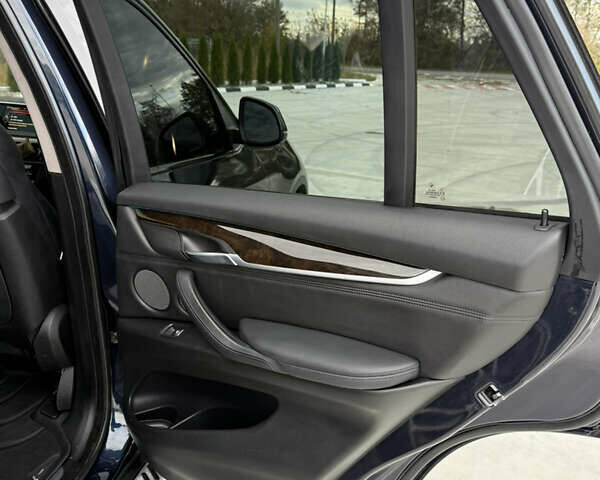 Синий БМВ Х5, объемом двигателя 3 л и пробегом 250 тыс. км за 24900 $, фото 7 на Automoto.ua