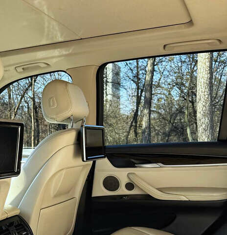 Синій БМВ Х5, об'ємом двигуна 2.98 л та пробігом 215 тис. км за 27000 $, фото 4 на Automoto.ua