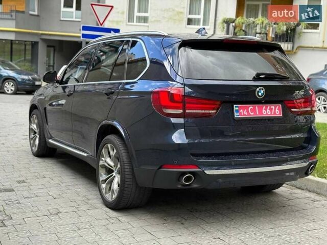 Синій БМВ Х5, об'ємом двигуна 3 л та пробігом 248 тис. км за 26000 $, фото 4 на Automoto.ua