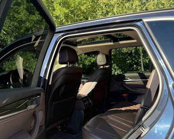 Синій БМВ Х5, об'ємом двигуна 3 л та пробігом 221 тис. км за 30000 $, фото 8 на Automoto.ua